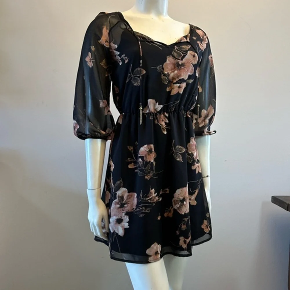Pretty floral dress. Sheer with tank liner. Tassel details. Elastic waistband. - Picture 8 of 13